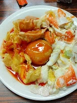 Crab Rangoon Pot Stickers with a Chinese Donut Under Sweet and Sour with the Crab and Cheese